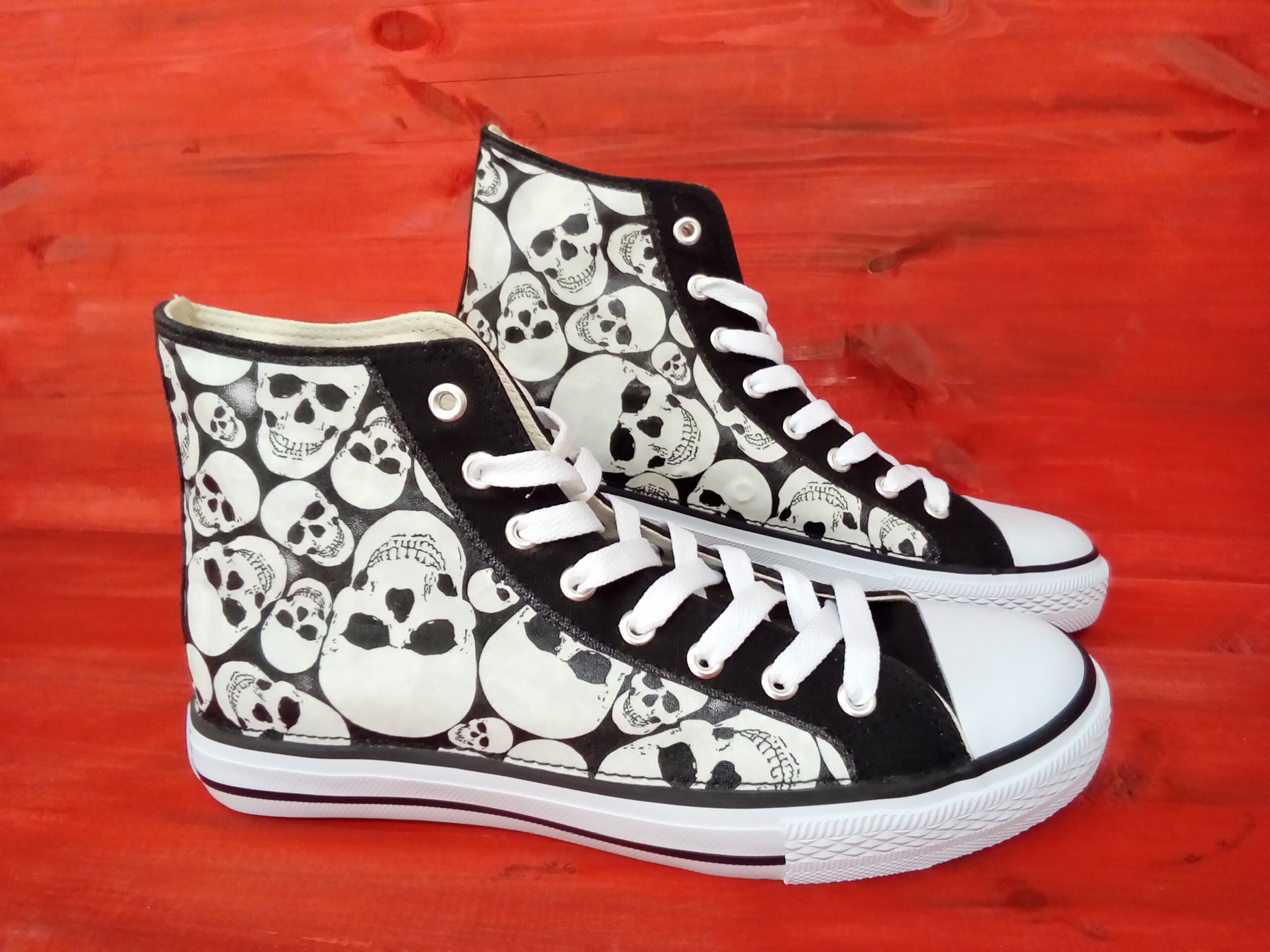 Glow In The Dark Skull Faces high top sneaker